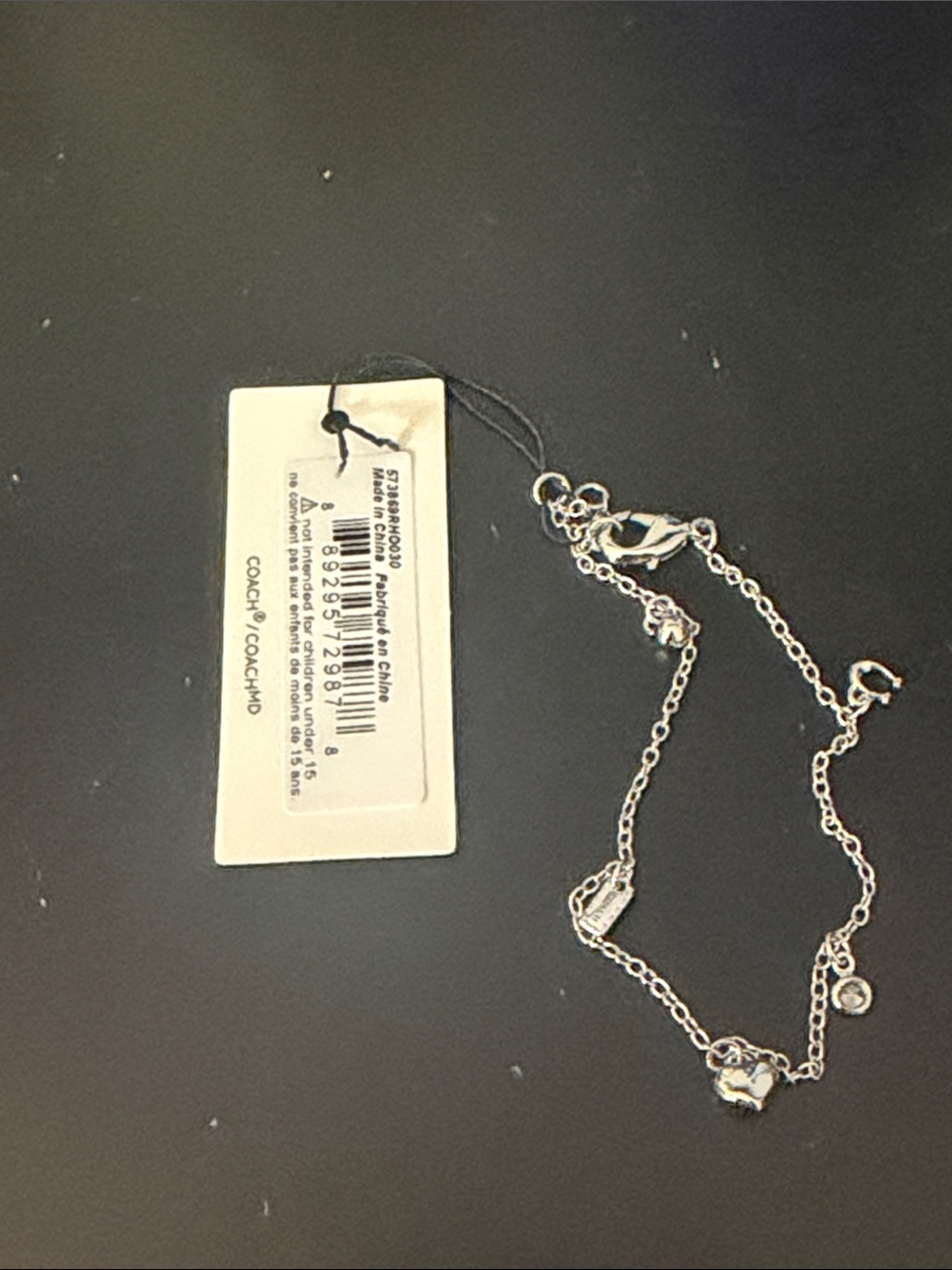 Coach Silver Tone Charm Chain Bracelet with Logo Accent